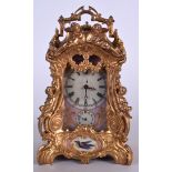 A LARGE SEVRES PINK PORCELAIN ORMOLU CARRIAGE CLOCK, painted with birds amongst foliage. 24.5 cm to