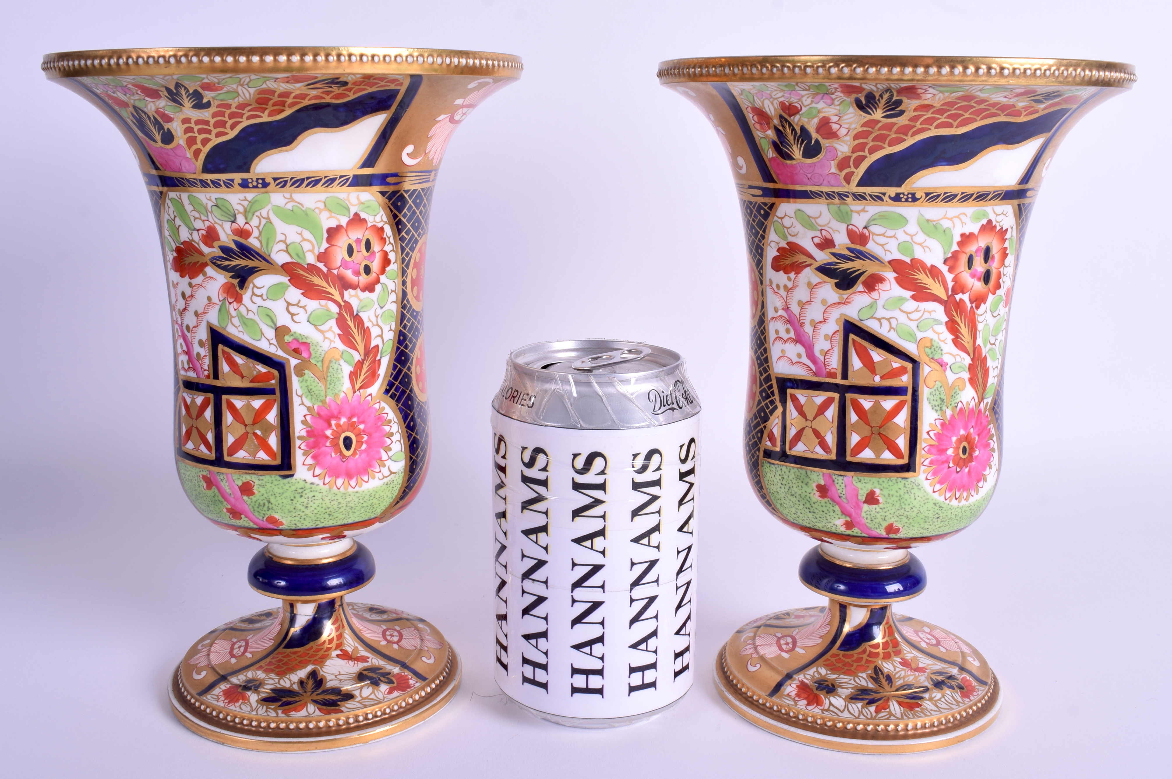 A GOOD PAIR 19TH CENTURY SPODE COPELAND GOBLET VASES painted with bright imari tones. 21 cm x 12 cm