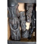 A GROUP OF WOODEN TRIBAL FIGURES, varying form and size. Largest 58 cm. (6)