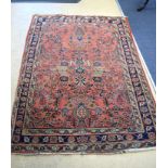 AN ANTIQUE PERSIAN SAROUK RUG, probably woven by two weavers, notable difference to each half. 150