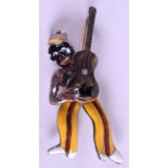 A CHARMING SILVER AND ENAMEL BROOCH IN THE FORM OF A MUSICIAN, formed playing a guitar. 7.75 cm lon