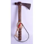 AN UNUSUAL NORTH AMERICAN INDIAN TRIBAL TOMAHAWK possibly Crow people, with stud work decoration. 4