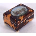 A VICTORIAN CARVED TORTOISHELL BOX, reverse painted with a view of Westminster. 6.5 cm wide.