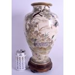 A LARGE EARLY 20TH CENTURY JAPANESE MEIJI PERIOD SATSUMA VASE painted with birds beside lakes. 34 c