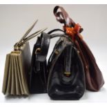 A GROUP OF FOUR VINTAGE HANDBAGS, varying style. (4)