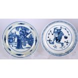 A MATCHED PAIR OF CHINESE BLUE AND WHITE PORCELAIN SAUCERS, one decorated with figures in a landsca