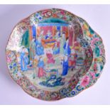 A MID 19TH CENTURY CHINESE CANTON FAMILLE ROSE SHELL DISH painted with figures. 24 cm x 21 cm.