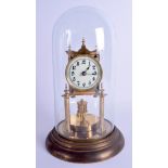 A VINTAGE BRASS ANNIVERSARY CLOCK. 26 cm high.