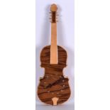 A WALL CLOCK IN THE FORM OF A VIOLIN, formed with black hands. 61 cm long.