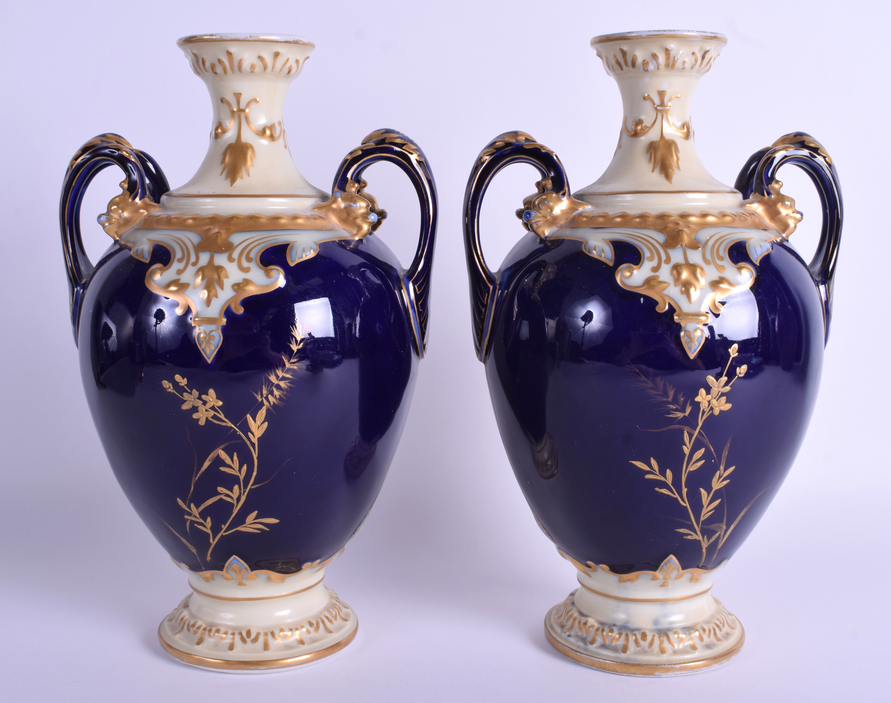 A PAIR OF FRENCH LIMOGES PORCELAIN VASES decorated with foliage. 24 cm high. - Image 2 of 4