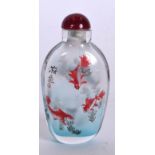 A CHINESE REVERSE PAINTED SNUFF BOTTLE, depicting swimming fish. 8 cm high.