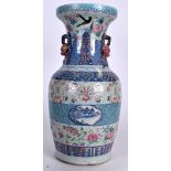 A RARE 19TH CENTURY CHINESE FAMILLE ROSE BLUE AND WHITE VASE, painted with landscapes in panels and