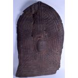 A 19TH CENTURY AFRICAN RHINOCEROS HORN HIDE SHIELD with dimpled decoration, possibly Ethiopian. 94