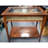 A GOOD EDWARDIAN BIJOUTERIE CABINET ON STAND, inlaid with satinwood foliage upon tapering legs. 77