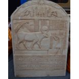 A LARGE EGYPTIAN PLASTER PANEL, decorated in relief with a figure encased within hieroglyphics. 73