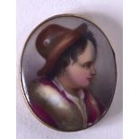 AN EARLY 20TH CENTURY EUROPEAN PAINTED PORCELAIN PLAQUE, depicting a young boy wearing a hat. 3.6 c