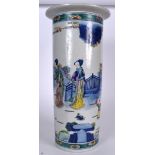 A LARGE CHINESE DOUCAI PORCELAIN STICK STAND, painted with females in a fenced garden. 50 cm high.