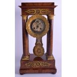 A MID 19TH CENTURY FRENCH WALNUT AND GILT METAL PORTICO CLOCK. 49 cm x 23 cm.