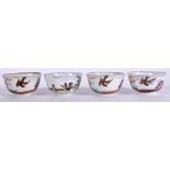 A SET OF FOUR 18TH CENTURY CHINESE PORCELAIN TEA BOWLS, painted with chickens in a landscape. 7.25