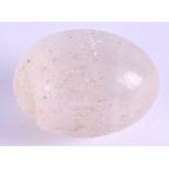 AN UNUSUAL ANTIQUE CARVED NATURAL HISTORY EGG possibly Opal or Moonstone. 4 cm x 5 cm.