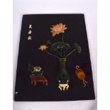 A CHINESE INSET PANEL, depicting precious objects and foliage. 33 cm x 25.5 cm.