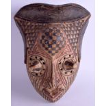 AN UNUSUAL TRIBAL AFRICAN POLYCHROMED WOOD MASK decorated with zig zag motifs. 30 cm x 21 cm.