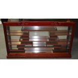 A CHINESE HARDWOOD SNUFF BOTTLE DISPLAY CABINET. 51 cm x 85 cm.