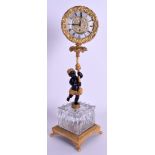 A RARE 19TH CENTURY FRENCH CRYSTAL AND BRONZE MANTEL CLOCK formed as a young semi clad boy holding