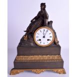 A 19TH CENTURY FRENCH BRONZE MANTEL CLOCK modelled with a seated female upon an outcrop. 35 cm x 24