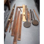 A COLLECTION OF ANTIQUE TRIBAL WEAPONS AND OTHER ARTICLES, spears, arrows etc, some bearing old lab