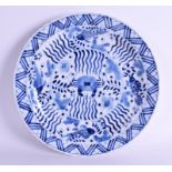 A 19TH CENTURY CHINESE BLUE AND WHITE SCALLOPED FISH PLATE Kangxi style. 24 cm wide.