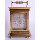 AN UNUSUAL 19TH CENTURY FRENCH BRASS CARRIAGE CLOCK with rare movement engraved with mask heads. 15