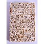 A MID 19TH CENTURY CHINESE CARVED CANTON IVORY CARD CASE depicting figures within landscapes. 7.75