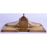 AN ART NOUVEAU WMF BRASS DESK STAND. 26 cm x 11 cm.