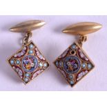 A PAIR OF EARLY 20TH CENTURY YELLOW METAL MICRO MOSAIC CUFFLINKS, formed with central floral panel.