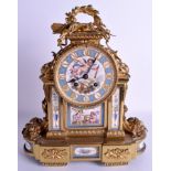 A 19TH CENTURY FRENCH BRONZE AND PORCELAIN MANTEL CLOCK painted with putti in various pursuits. 38