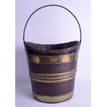 A 19TH CENTURY DUTCH BRASS BOUND OVAL WOOD COAL BUCKET. 52 cm x 30 cm.