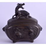 A GOOD 19TH CENTURY JAPANESE MEIJI PERIOD BRONZE CENSER AND COVER decorated with Buddhistic lions.