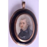 A GEORGE III GOLD CASED IVORY PORTRAIT MINIATURE. Image 3.25 cm x 4.5 cm.