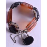 AN ANTIQUE SCOTTISH SILVER AND AGATE BRACELET. 18 cm long.