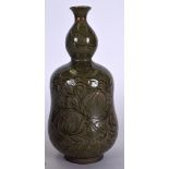 A CHINESE OLIVE GREEN CHINESE PORCELAIN VASE, incised with fish and foliage. 29.5 cm high.