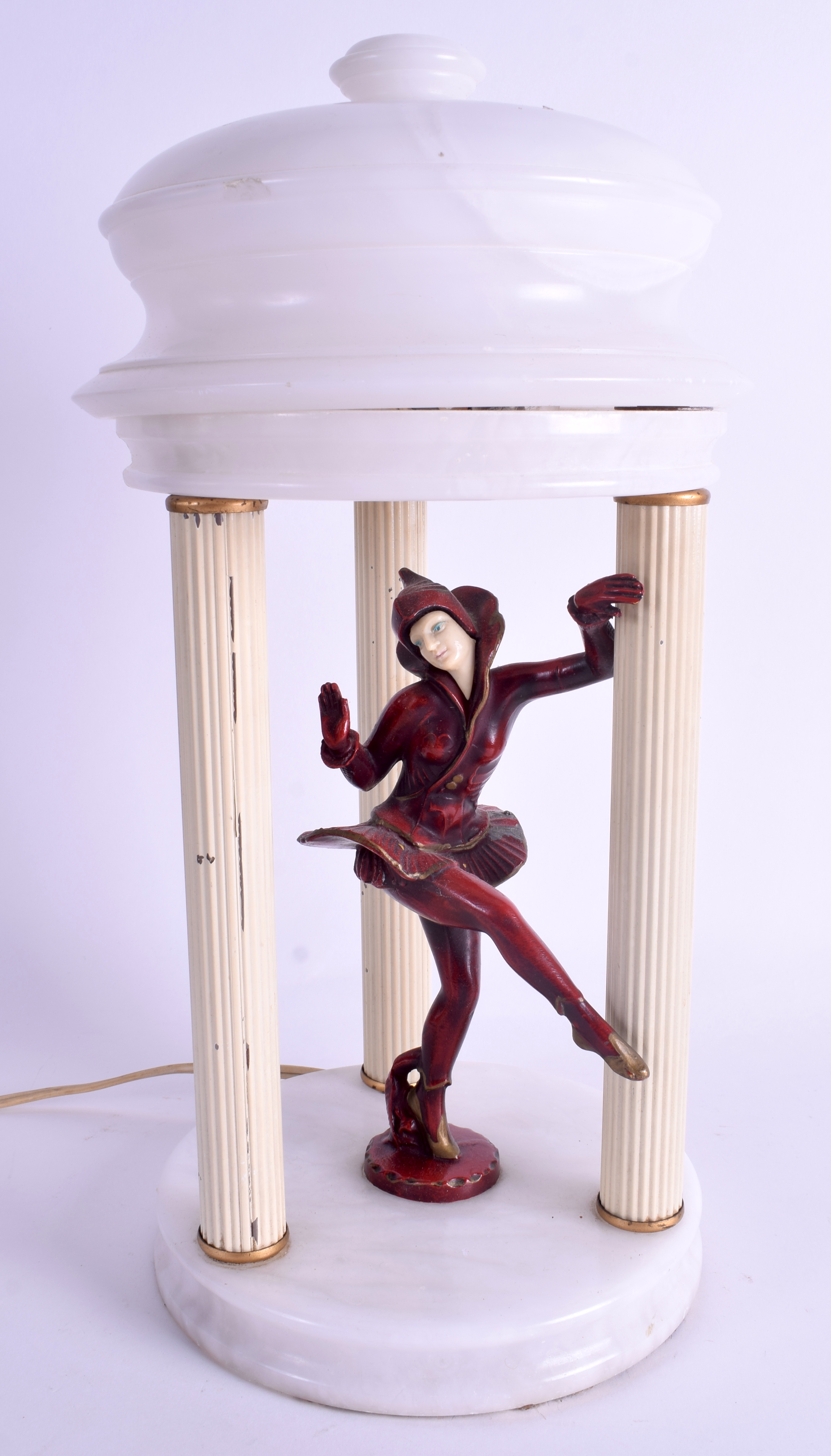 AN UNUSUAL ART DECO PAINTED SPELTER FIGURE in the form of a lamp. 38 cm high.