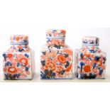 A PAIR OF IMARI PORCELAIN TEA CANISTER, together with a larger example. Largest 12 cm high. (3)