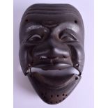 AN 18TH CENTURY JAPANESE EDO PERIOD IRON MASK with moveable jaw. 16 cm x 12 cm.