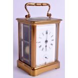 AN ANTIQUE FRENCH STRIKING CARRIAGE CLOCK. 16 cm high inc handle.