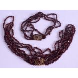 A GEORGIAN GARNET NECKLACE, formed with gold clasp and matching bracelet. (2)