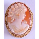 AN EARLY 20TH CENTURY GOLD MOUNT CAMEO BROOCH, carved formed a portrait of a pretty female. 4.5 cm