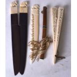 THREE EARLY 20TH CENTURY CARVED AFRICAN PAPER KNIVES, together with a fan etc. (qty)