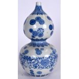 A CHINESE BLUE AND WHITE DOUBLE GOURD PORCELAIN VASE, decorated with stylised foliage and greek key