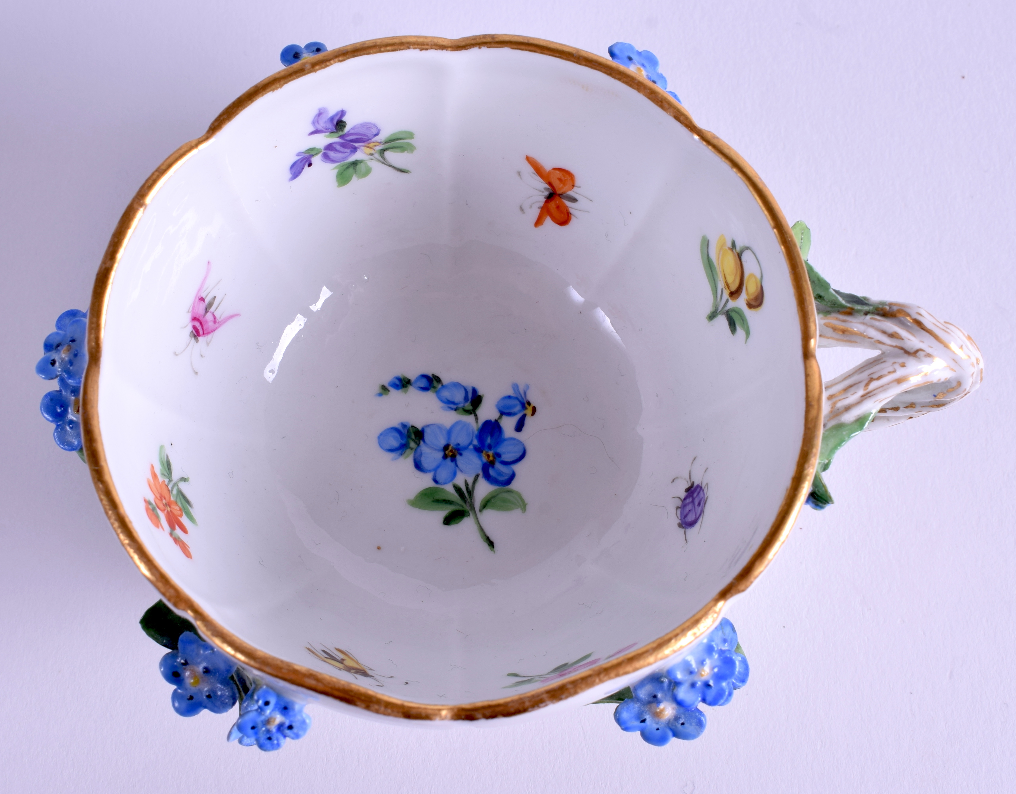 A MEISSEN ENCRUSTED PORCELAIN CUP AND SAUCER encrusted with flowers. (2) - Image 3 of 4